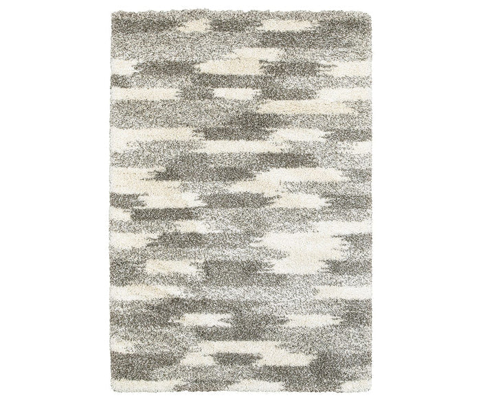 Experience cozy comfort and contemporary style with the Oriental Weavers Henderson / 565J Rug. Featuring a rectangular design and an abstract, cloud-inspired pattern in versatile multi-colored shades, this plush area rug boasts a soft shaggy texture that enhances any modern space. Ideal for those seeking stylish neutral rugs with a sleek, modern geometric look.