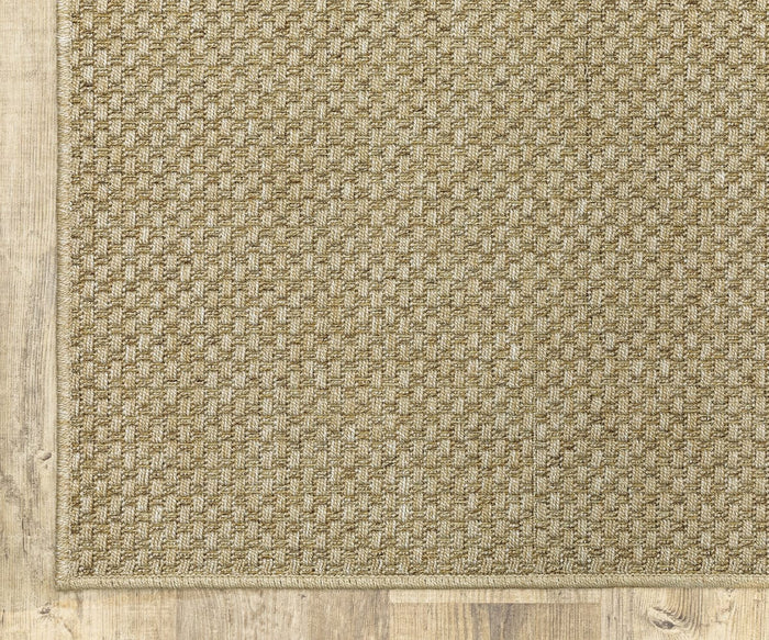 A close-up of the corner of the Oriental Weavers Karavia / 2160X Rug, featuring a durable, textured checkerboard pattern in beige, crafted from easy-care polypropylene and displayed on a light wooden floor.