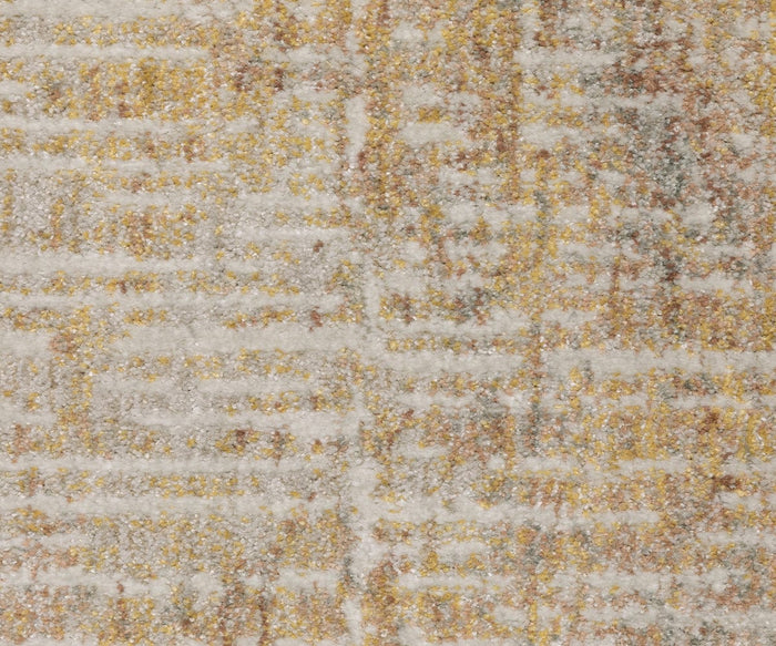 A close-up of the Oriental Weavers Mallory / MAL09 Rug, featuring a textured surface power-loomed with space-dyed polypropylene in a blend of beige, gold, and light brown tones that create an abstract, mottled pattern.