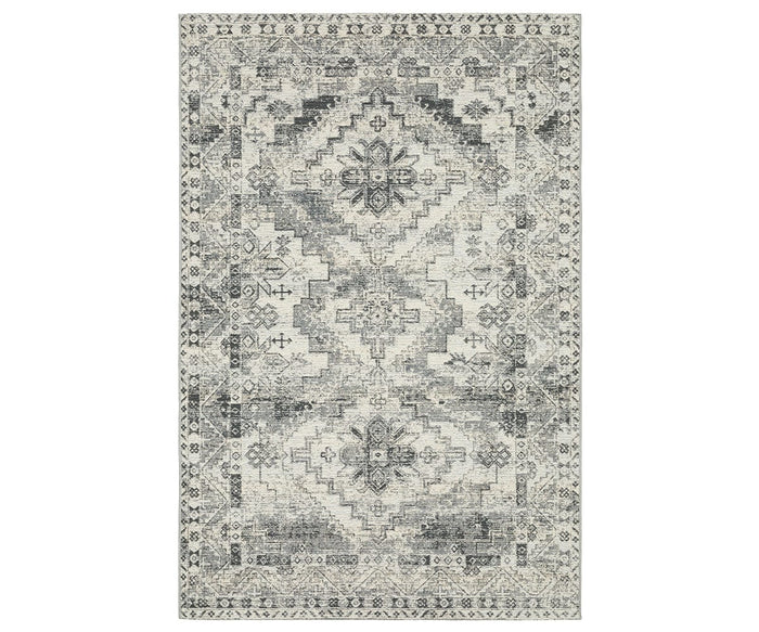 The Oriental Weavers Naples / 1346Z Rug is a rectangular rug that showcases a vintage-style, intricate geometric and floral pattern in grey and multi-colored shades. Made from durable polypropylene, this rug is both stylish and resilient—perfect for use as an indoor or outdoor rug.