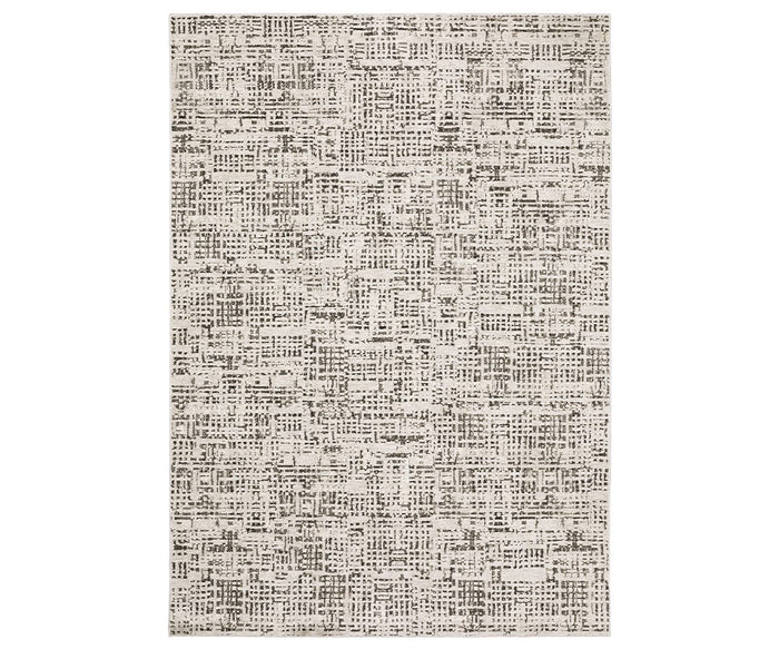 Oriental Weavers Nebulous / 2060W Rug in Beige/Multi is a rectangular area rug featuring a modern, abstract grid pattern with uneven, intersecting lines and scattered shapes for a textured, contemporary look. Crafted from soft polyester yarn, its design showcases shades of gray and black on an off-white background, embodying the signature style of modern abstract rugs.