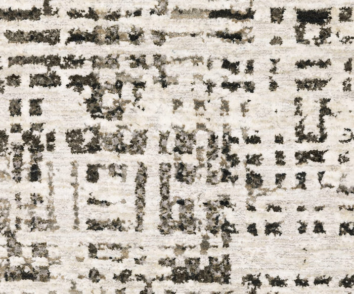 The Oriental Weavers Nebulous / 2060W Rug features an abstract beige and brown design with a distressed geometric pattern, highlighted by irregular squares and lines for a contemporary, textured look. Expertly crafted from durable polyester yarn, this rug is a standout piece from the Nebulous Collection, showcasing modern abstract style and long-lasting quality.