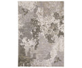 The Oriental Weavers Nebulous / 5091E Rug is a rectangular area rug showcasing a modern, mottled pattern in versatile beige and multi-colored tones. Made from durable polyester yarn, it brings a contemporary and textured look to any room.