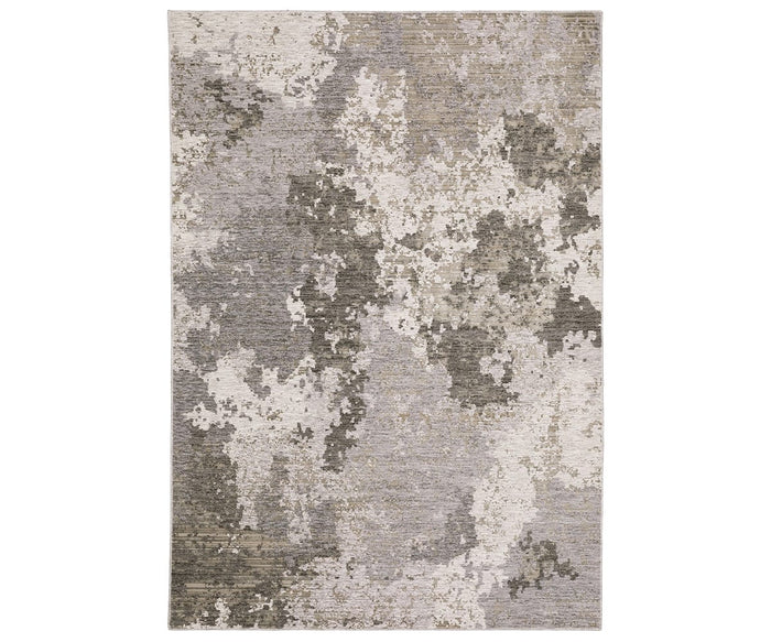 The Oriental Weavers Nebulous / 5091E Rug is a rectangular area rug showcasing a modern, mottled pattern in versatile beige and multi-colored tones. Made from durable polyester yarn, it brings a contemporary and textured look to any room.