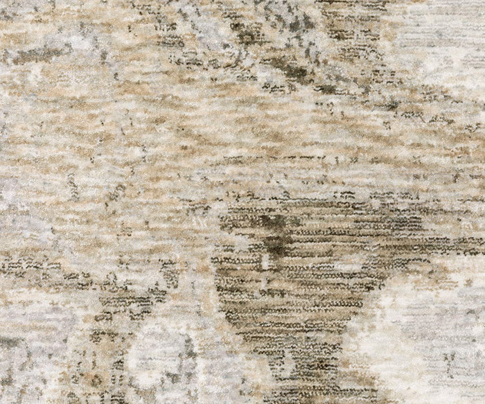 The Oriental Weavers Nebulous / 530E Rug features a beige and light brown abstract textured design with a marbled, weathered appearance and irregular blending patterns. Crafted from soft polyester yarn as part of the Nebulous Collection, this rug effortlessly complements modern abstract rugs with its contemporary style.
