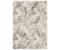 The Oriental Weavers Nebulous / 561E Rug features a rectangular design with a beige background and abstract black and gray marbled patterns, embodying modern abstract style. Crafted from soft polyester yarn in space-dyed neutrals, this rug offers a subtle yet striking visual effect.