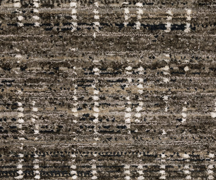 The Oriental Weavers Nebulous / 751D Rug features a textured brown surface with a plaid pattern of intersecting white and dark lines, inspired by the Nebulous Collection. Crafted from space-dyed polyester for enhanced durability, this plush and soft rug combines light and dark brown hues that capture the look of modern abstract designs.