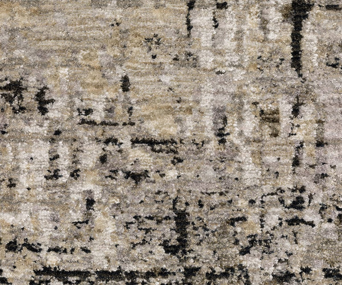 Close-up of the Oriental Weavers Nebulous / 91D Rug, a textured, abstract-patterned carpet from the Nebulous Collection in shades of beige, gray, cream, and black. It features a mix of irregular geometric shapes and blended colors, crafted with soft polyester yarn.