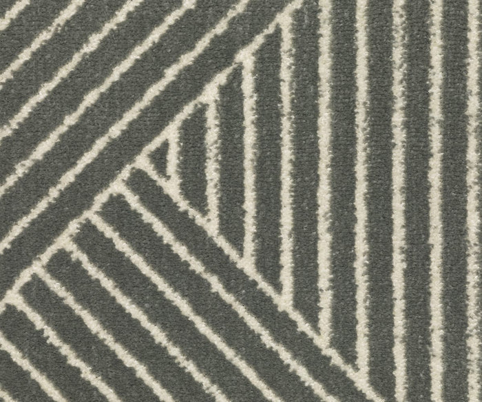 Featuring gray and white stripes with intersecting diagonal and vertical lines, the Oriental Weavers Raylan / RAY08 Rug displays a bold geometric design. Its soft, plush texture offers both comfort and style, while fade-resistant fibers help maintain its elegant appearance over time.