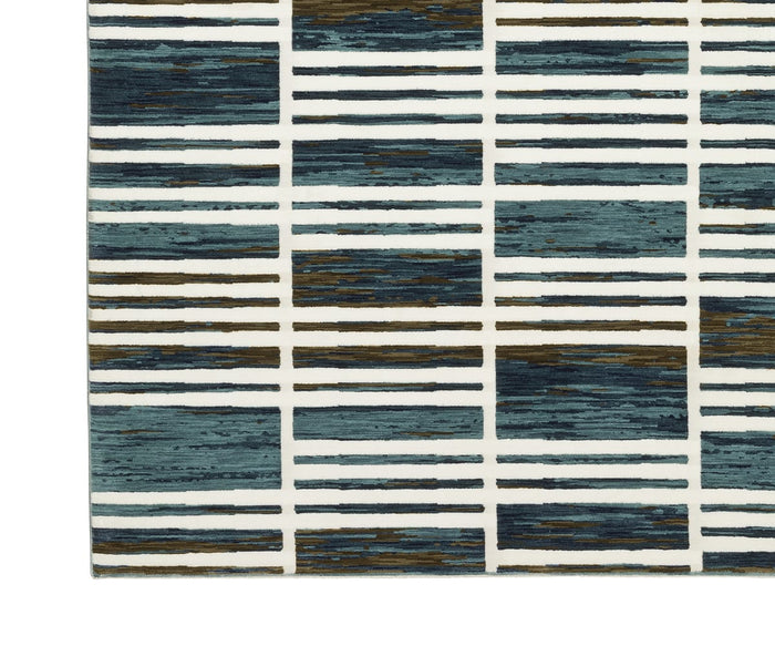 A section of the Oriental Weavers Reed / RE05A Rug displays a textured surface with horizontal and vertical lines in blue, brown, and white, creating a grid-like geometric pattern. Crafted from space-dyed polypropylene, this rug offers enhanced durability and subtle color variation.