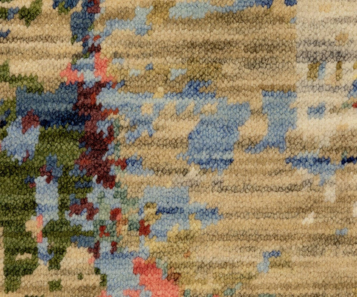 Here’s the rewritten sentence using your product data: A close-up of the Oriental Weavers Soleri / SOL06 Rug reveals its textured, multicolored surface with abstract patterns in beige, blue, green, and subtle hints of red and pink. Crafted from a wool and nylon blend on an Axminster loom, this rug features soft yet varied fibers that give it a tapestry-like appearance—a signature look of modern abstract rugs.