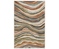The Oriental Weavers Tisdell / TIS07 Rug in Multi showcases wavy, layered lines in shades of brown, green, orange, blue, and cream. Inspired by natural geode or agate patterns, this modern abstract area rug is crafted from durable space-dyed polyester for lasting style.