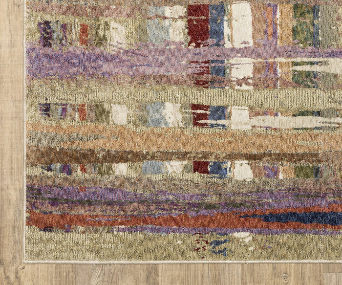 A corner of the Oriental Weavers Tisdell / TIS08 Rug, a durable area rug crafted from space-dyed polyester, features abstract horizontal stripes and block patterns in earth tones, purple, red, blue, and beige, displayed on a light wood floor.