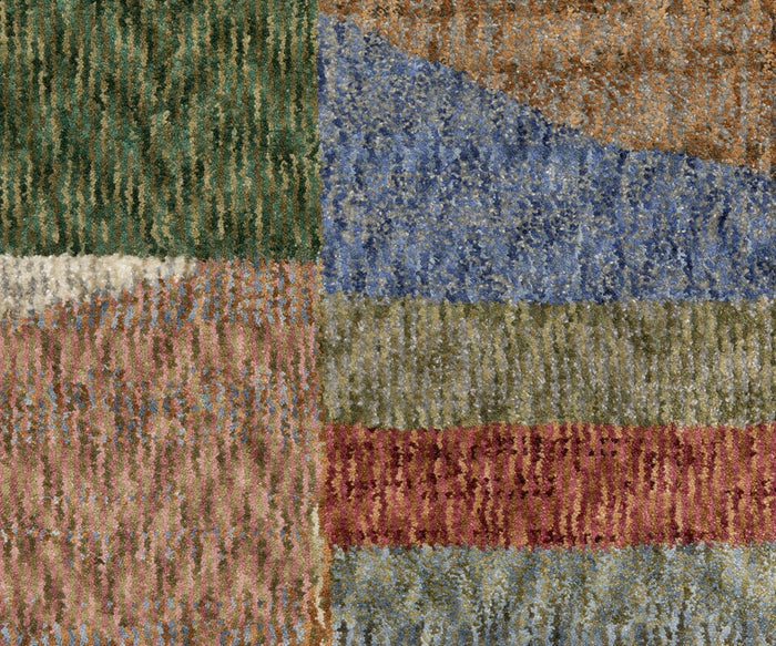 Introducing the Oriental Weavers Tisdell / TIS09 Rug—a modern abstract area rug featuring a textured design with rectangles in muted shades of green, blue, orange, beige, pink, and red. The subtle distressed and patterned look is complemented by a soft, fuzzy surface. Crafted from space-dyed polyester for enhanced durability, this rug seamlessly blends style and resilience to bring lasting beauty to any room.