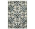 Oriental Weavers Torrey / 004Y Rug in White/Multi features a rectangular shape with a repeating geometric pattern of diamond shapes, intricate details, and abstract motifs. The design is highlighted by symmetrical accents throughout, all presented in soothing neutral and multi-colored tones on a white background.