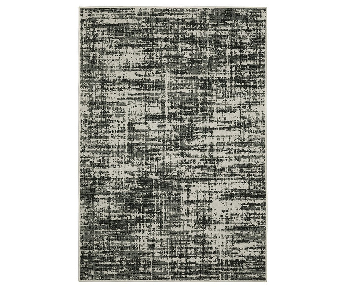 The Oriental Weavers Torrey / 531W Rug showcases a rectangular flatwoven design with abstract, textured motifs in black and multi tones on a light background. Its distressed appearance delivers a modern, contemporary look that integrates effortlessly with neutral décor.