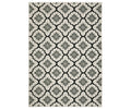 The Oriental Weavers Torrey / 5562E Rug features a rectangular flatwoven design with a repeating geometric floral pattern in Grey/Multi tones on a cream background. Its symmetrical shapes and stylized flowers are arranged in a grid-like layout, adding dynamic texture and visual interest.