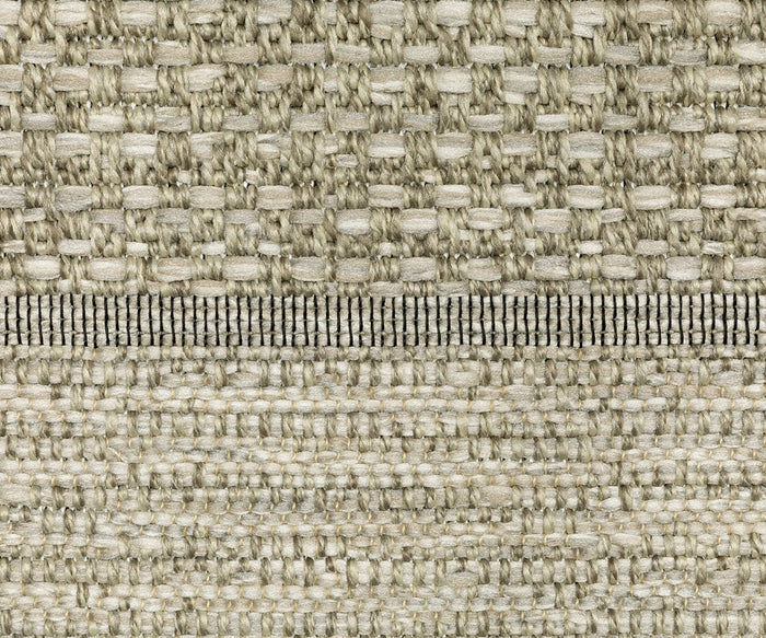 Close-up of the Oriental Weavers Tortuga / TR01A Rug, showcasing a woven beige fabric with a horizontal dark line separating two distinct textures: a chunkier weave on top and a finer, tightly woven section below—perfect for an easy-care polypropylene rug.