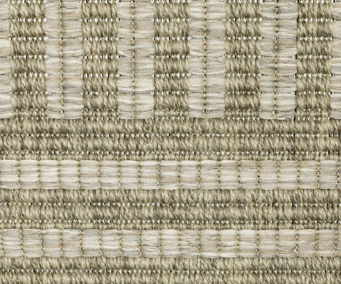 Close-up of the Oriental Weavers Tortuga / TR02A Rug, a woven textile featuring horizontal and vertical bands in shades of beige, tan, and cream. This easy-care rug showcases a textured, layered pattern created by thick and thin yarns.