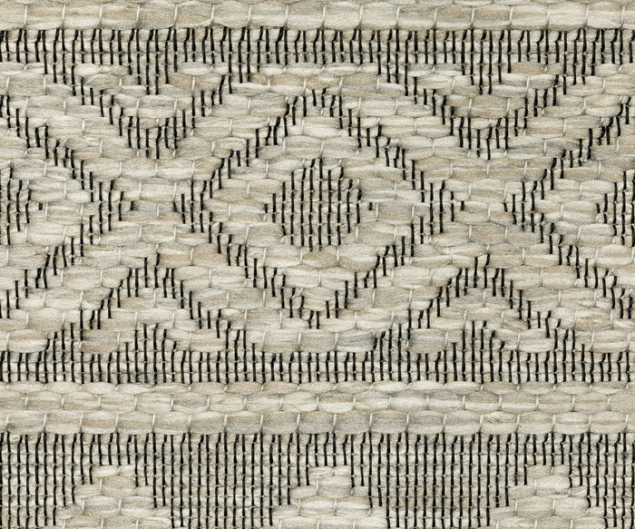 Close-up of the Oriental Weavers Tortuga / TR03A Rug, showcasing its woven geometric diamond and zigzag pattern in neutral beige and gray tones. Crafted from polypropylene, this rug features a thick and sturdy texture that emphasizes its detailed weaving technique while providing the convenience of easy maintenance.