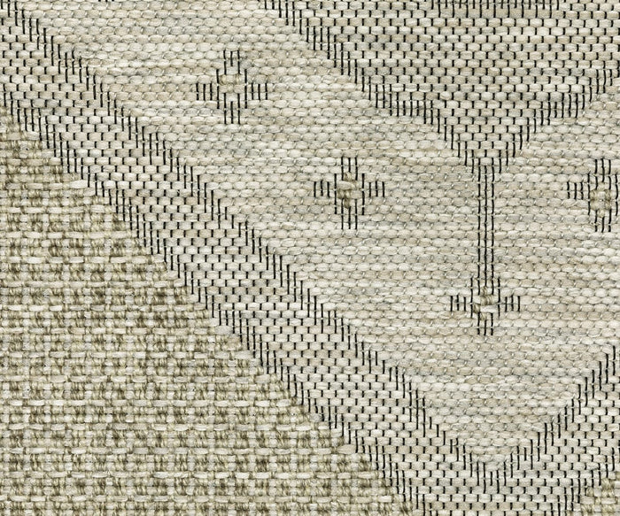 Close-up of the Oriental Weavers Tortuga / TR08A Rug, featuring a geometric triangular pattern with small cross designs on a cream and beige background. The clearly visible texture of the woven polypropylene threads highlights the durable construction and easy-care nature of this rug from the Tortuga Collection.