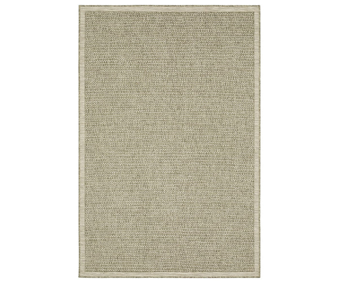 The Oriental Weavers Tortuga / TR12A Rug in Beige/Multi features a subtle, tightly woven texture with a slightly darker border around the edges. Power-loomed from durable polypropylene, this easy-care area rug offers both style and practicality for everyday living.