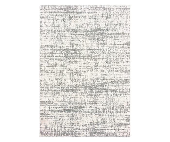 The Oriental Weavers Verona / 1803H Rug features a rectangular design with a white base accented by multi-colored abstract patterns reminiscent of brushstrokes or scattered lines. This neutral palette rug delivers a modern, textured appearance, expertly crafted from soft polyester microfiber to seamlessly blend style and comfort into any space.