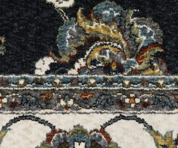 Close-up of the Oriental Weavers Vivian / VI01B Rug, showcasing ornate floral patterns in shades of blue, green, yellow, and white with a decorative border running horizontally across the center. Inspired by classic Persian designs, this exquisite rug brings timeless elegance to any space.