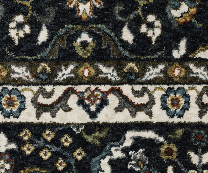 Close-up of the Oriental Weavers Vivian / VI04C Rug, which showcases a Persian-inspired design with a traditional color palette of dark blue, white, green, and red. The image highlights the intricate floral and geometric patterns as well as the detailed texture of its microfiber polyester weave.