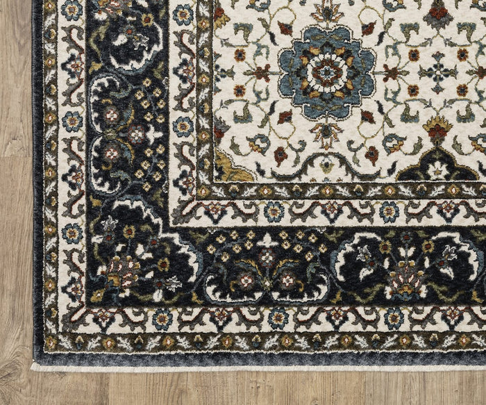 Corner of the Oriental Weavers Vivian / VI04D Rug, a rectangular ornate microfiber polyester rug with a dark blue and cream border, intricate floral patterns, and a central blue medallion in a traditional color palette, placed on a light wood floor.