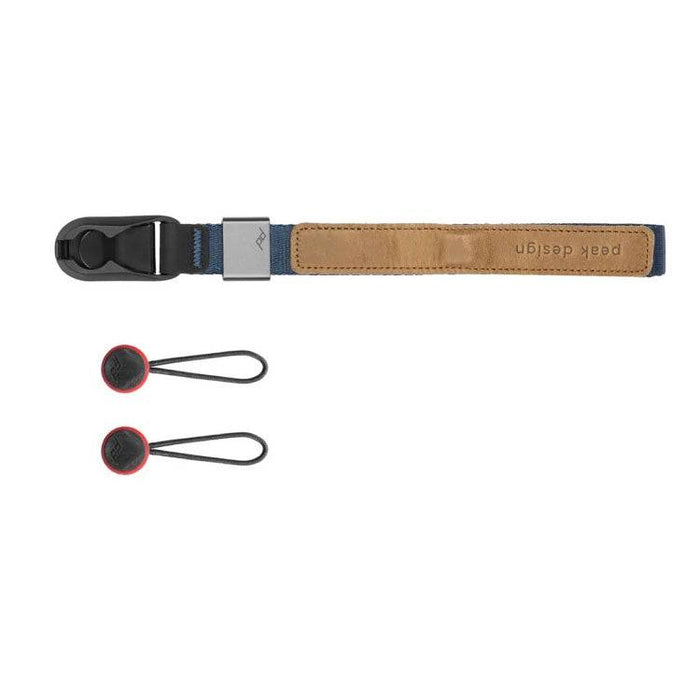 Peak Design Cuff wrist strap attached to a camera, showcasing low-profile, durable, and secure camera protection with aluminum hardware and Anchor Link system