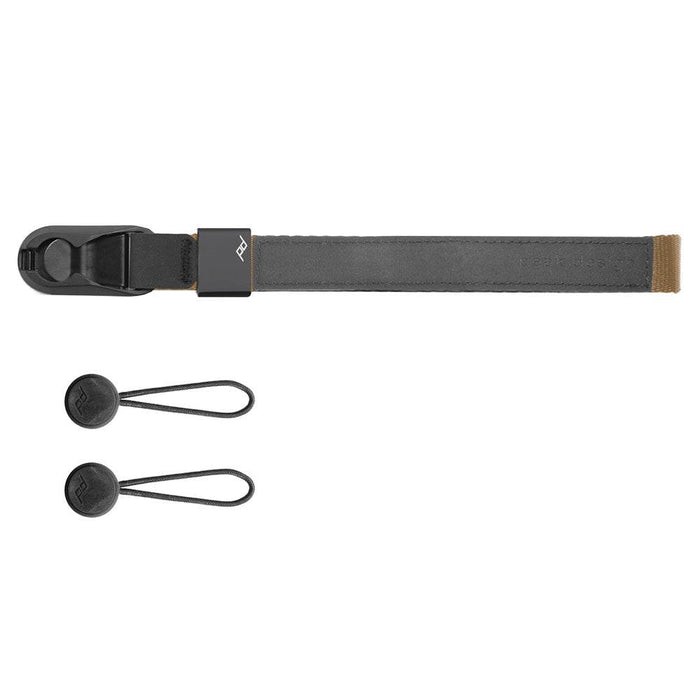 Peak Design Cuff wrist strap in black showing aluminum hardware and secure wrist loop for camera safety