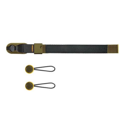 Peak Design Cuff wrist strap attached to camera with aluminum hardware and durable nylon webbing