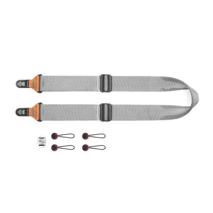 Peak Design Slide camera strap with Anchor Link connectors, seatbelt-style webbing, and silicone grip for versatile wear and secure comfort