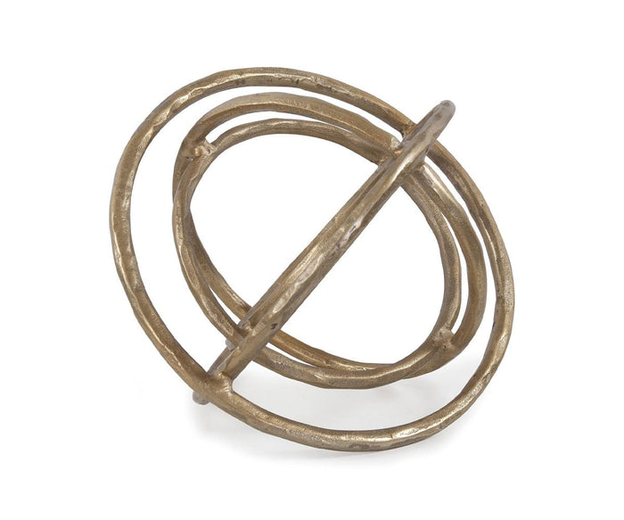 Introducing the Planetary Rings Sculpture—an antiqued brass decorative object featuring three intersecting metal rings that create a striking spherical, geometric form, displayed against a white background.
