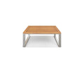 The Playa Mar Outdoor Coffee Table, featuring a teak finish wooden top and stainless steel legs, is shown from the front against a white background.