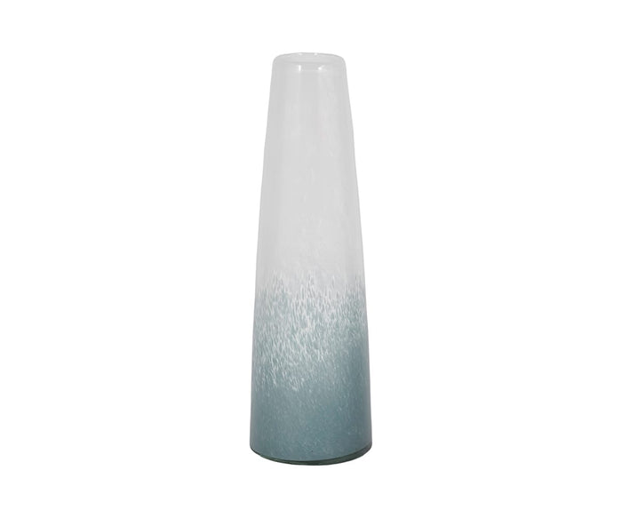 Sleek and cylindrical, the Polar Frost Vase showcases a smooth ombré effect that fades from crisp white at the top to blue and multi-toned speckles at the base. Hand-finished glass gives it a glossy sheen, emphasizing its simple, modern design.