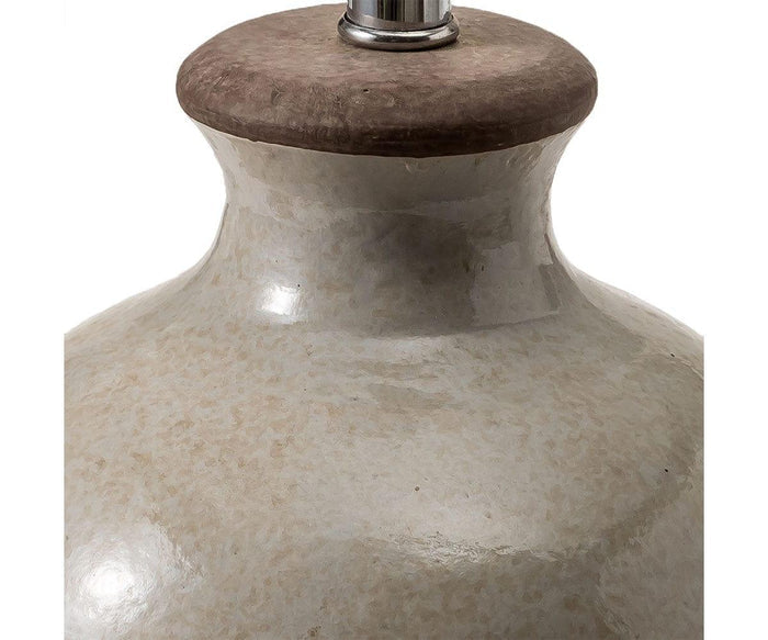 Close-up of the Polished Terracotta Lamp, featuring a glossy cream and beige marbled ceramic base topped with a round brown accent and a sleek silver metal rod extending upward—ideal for pairing with your favorite fabric shade to achieve a refined, contemporary look.
