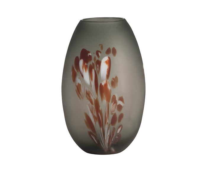 Oval-shaped and hand-finished, the Poppy Frost Vase features a multi-colored design with a smoky gray base and abstract reddish-brown floral accents, shown against a white background.