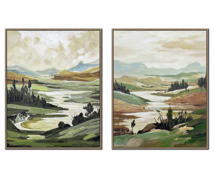 The Quiet Current I & II Wall Art Set features two hand-embellished canvases in multi colors, each showcasing sweeping landscapes of winding rivers, rolling hills, trees, and distant mountains beneath cloudy skies. Beautifully presented in oak floating frames, this set artfully enhances the natural charm of any serene space.