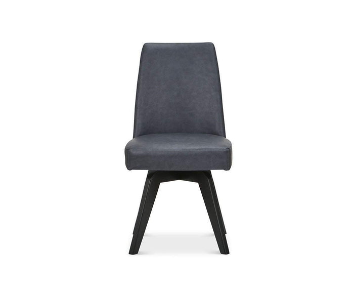 The Raynor Swivel Dining Chair, upholstered in grey with a padded seat and backrest, features four angled black legs and is shown against a plain white background.