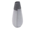 Introducing the Rolled Two Tone Vase: a tall, modern ceramic vase in grey featuring a sleek body with horizontal textured lines and a matte finish. Its design is completed with a dark gray top section and a narrow, angled opening.