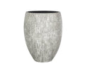 Beige, tall, oval-shaped Rydell planter made from fiberstone, featuring a textured vertical line pattern and a smooth, dark interior.