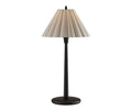 The Scallop Table Lamp, featuring a slender black base and a pleated beige lampshade, is photographed against a white background and emits a warm glow to enhance any setting.