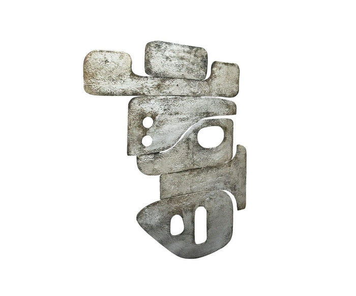 Sculpted Cairn Art I presents an abstract metallic wall sculpture composed of irregular, overlapping silver panels with various cut-out shapes, arranged vertically against a white background—an eye-catching piece of metallic finish wall art that brings a sophisticated touch to mid-century decor.