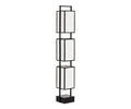 Introducing the Shizuka Wooden Floor Lamp in black—a modern floor lamp featuring a sleek black metal frame with three stacked rectangular white lampshades, each separated by open space and reminiscent of an elegant lantern design. The lamp stands on a sturdy black square base.