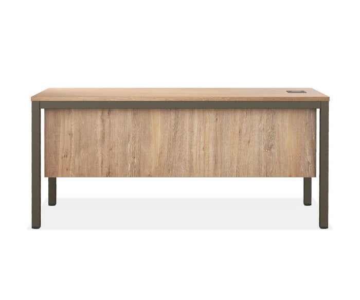 The Slater 63″ Desk in Oak Driftwood is a rectangular contemporary desk featuring a striking wood grain veneer, sturdy metal legs, a modesty panel, and a convenient cable management hole on the top right corner.
