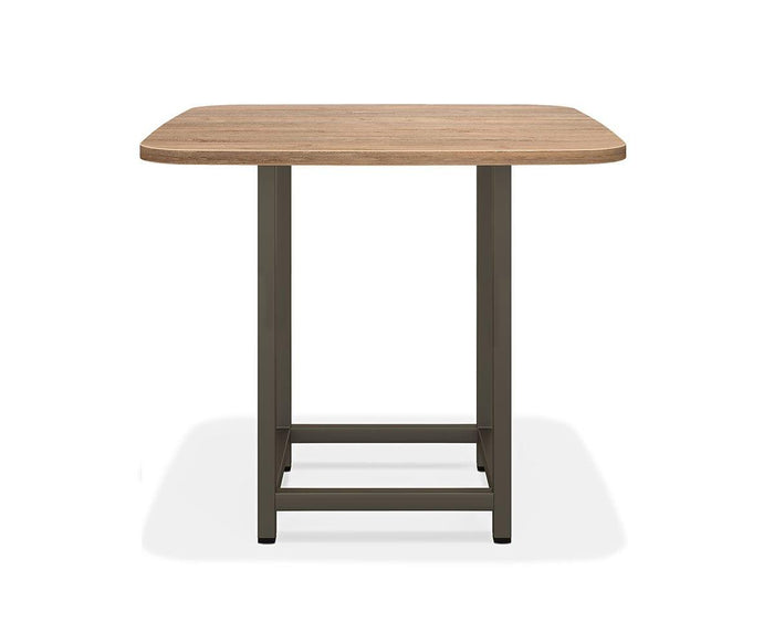 The Slater Bar Height Square Meeting Table features a rectangular wood grain top with rounded corners and black metal legs, shown against a white background.