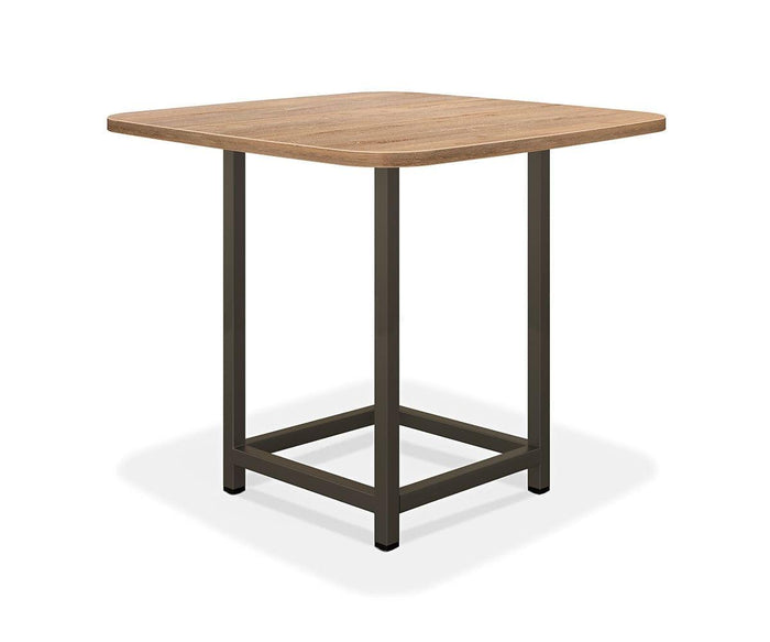 The Slater Bar Height Square Meeting Table features a square wooden top with rounded edges and black metal legs, set against a plain white background. Its rich wood grain stands out, making it an ideal choice for modern spaces seeking a sophisticated wood grain dining table.