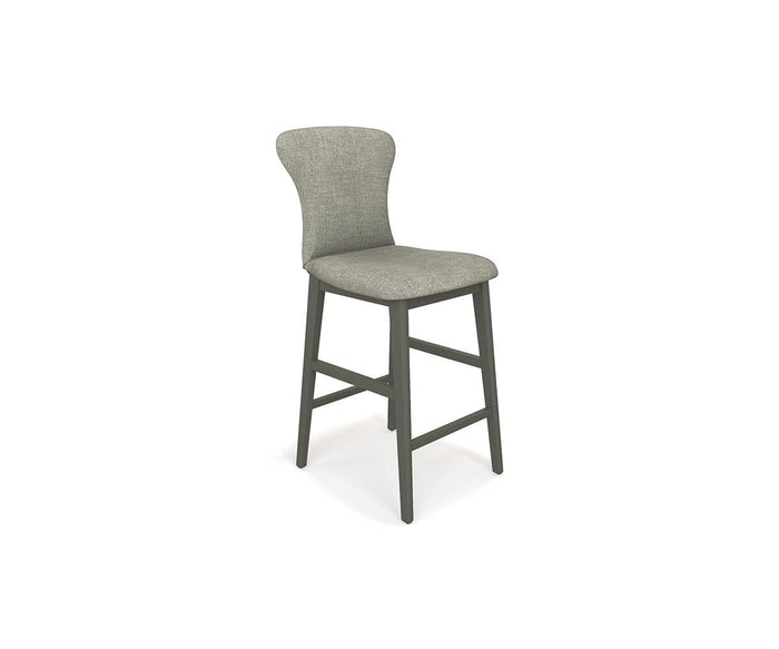 The Slater Bar Stool showcases a modern and minimalist design, featuring gray upholstery, a curved backrest, four wooden legs, and a cushioned seat. A footrest connects the front two legs for added comfort. Set against a plain white background, this stylish bar stool is an excellent choice for those looking to enhance their space with contemporary flair.